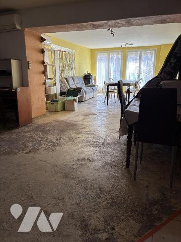 Maison d'habitation avec jardin attenant