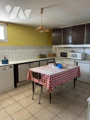 Maison d'habitation avec jardin attenant
