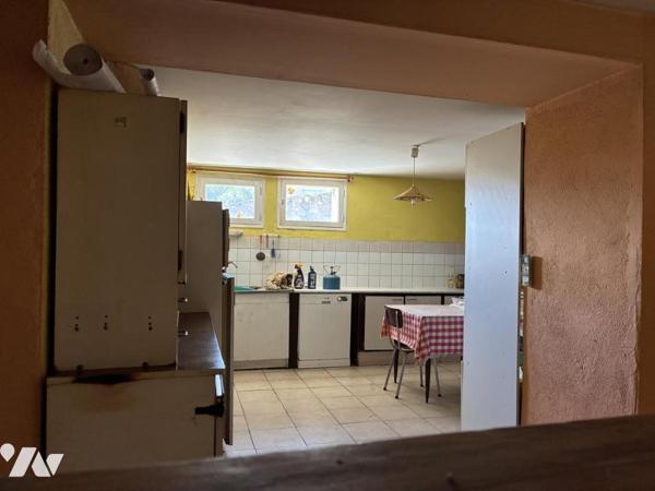 Maison d'habitation avec jardin attenant