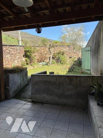 Maison d'habitation avec jardin attenant