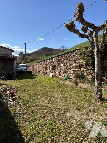 Maison d'habitation avec jardin attenant