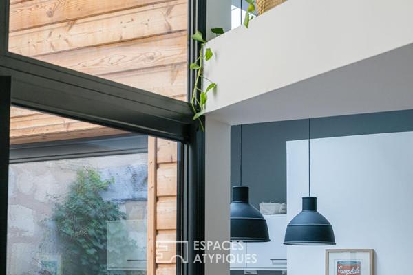 Loft en rez-de-chaussée avec terrasse et grand garage