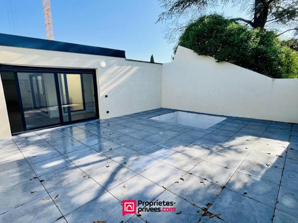 Loft industriel T4 neuf 182m², terrasse 46m², piscine, centre-ville