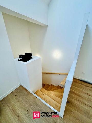 Loft industriel T4 neuf 182m², terrasse 46m², piscine, centre-ville