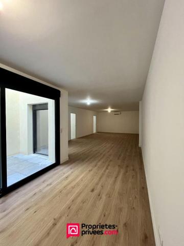 Loft industriel T4 neuf 182m², terrasse 46m², piscine, centre-ville