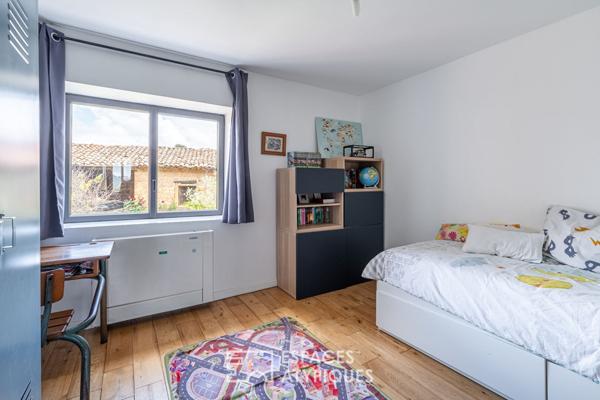 Maison en pierres dorées et sa vue imprenable