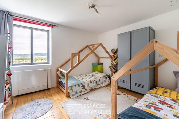 Maison en pierres dorées et sa vue imprenable