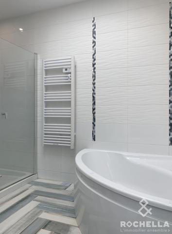 Maison de plain-pied de 150m2, 4 chambres, un bureau, jardin, garage à Chatelaillon-plage.