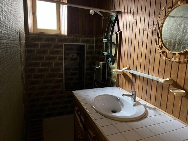 Bien de 3 chambres avec un espace commercial au rez-de-chaussée