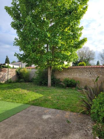 Un petit écrin et son jardin