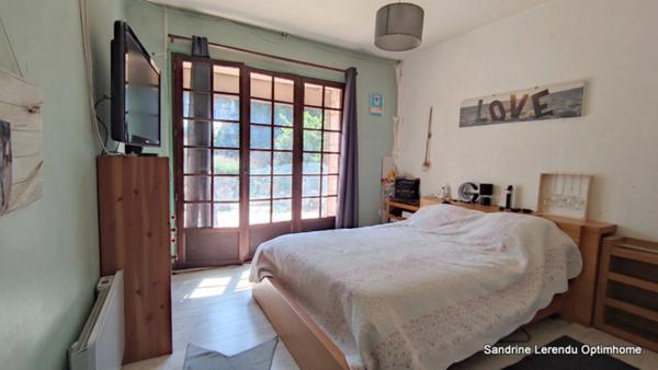 L'élégance d'une grande maison de village Normande en Pierre de Taille de 298 m² à réinventer