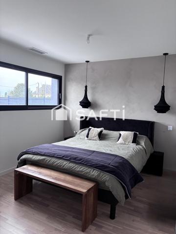 Maison d'architecte contemporaine avec prestations haut de gamme et bel espace extérieur, volumes, lumières et design