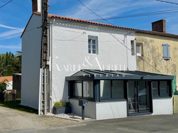 Maison 2 chambres, véranda, garage et jardin