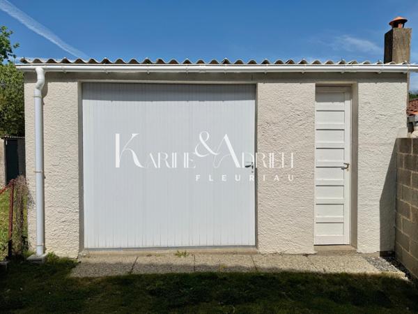 Maison 2 chambres, véranda, garage et jardin