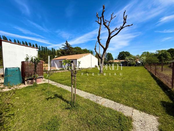 Maison 2 chambres, véranda, garage et jardin