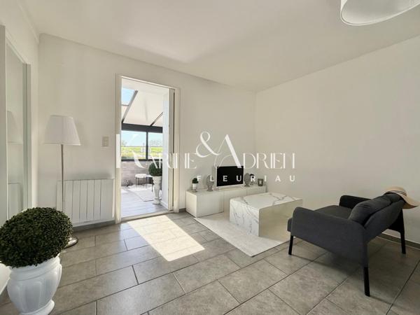 Maison 2 chambres, véranda, garage et jardin