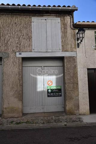 garage avec  pièce sur le dessus