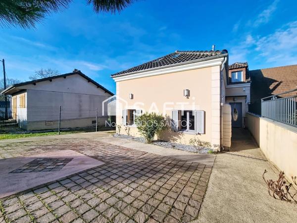 Maison familiale 4 chambres avec sous sol total, grand terrain.