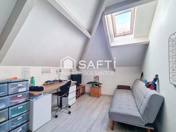 Maison familiale 4 chambres avec sous sol total, grand terrain.