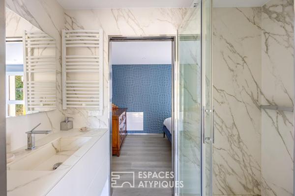 Maison d’architecte dans son écrin de verdure au coeur du Rebberg