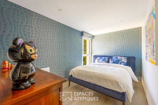 Maison d’architecte dans son écrin de verdure au coeur du Rebberg