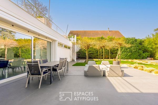 Maison d’architecte dans son écrin de verdure au coeur du Rebberg