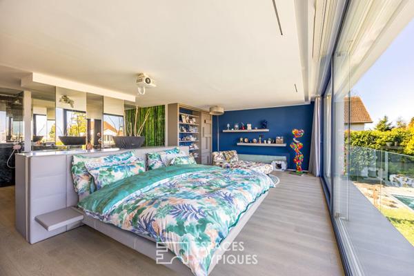 Maison d’architecte dans son écrin de verdure au coeur du Rebberg