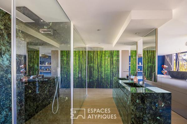 Maison d’architecte dans son écrin de verdure au coeur du Rebberg