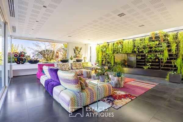 Maison d’architecte dans son écrin de verdure au coeur du Rebberg