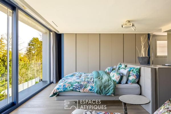 Maison d’architecte dans son écrin de verdure au coeur du Rebberg