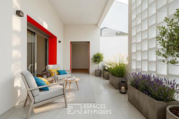 Rénovation de prestige sous verrière aux accents fifties