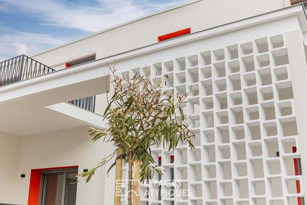 Rénovation de prestige sous verrière aux accents fifties