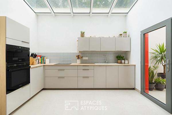 Rénovation de prestige sous verrière aux accents fifties