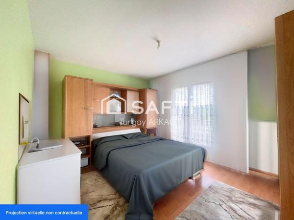 Découvrez le Charme Exceptionnel de cette Maison de 2010, Surplombant La Tour du Pin