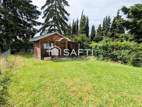 Maison 3 chambres, terrain et garage.