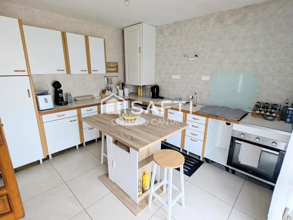 Maison 3 chambres, terrain et garage.