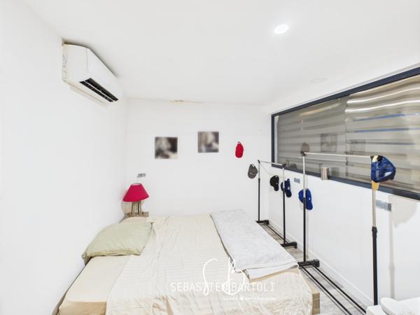 Deux locaux commerciaux et son appartement privatif