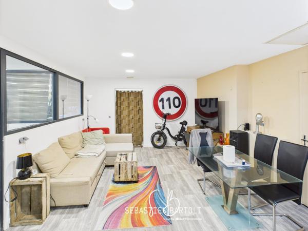 Deux locaux commerciaux et son appartement privatif