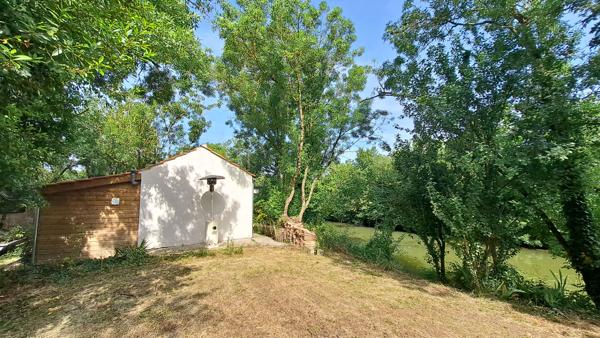 Propriété pleine de charme avec accès direct au canal et terrain de plus de 1 000 m²