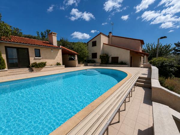 Maison 7 pièce(s) 5 chambre(s) 165 m²