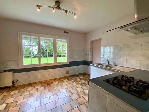 Plain pied avec beau jardin