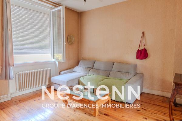 A Blaye-les-Mines, maison mitoyenne d'un côté 4 pièces principales sur sous-sol complet avec terrain attenant