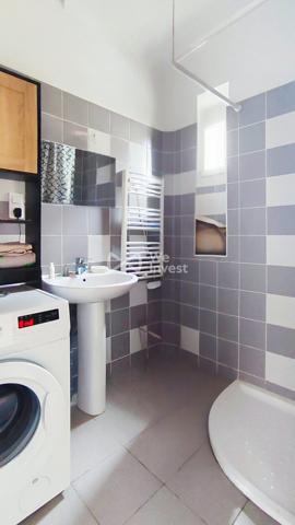 Immeuble 1 appartement + local commerciale.