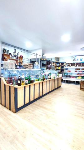 Immeuble 1 appartement + local commerciale.