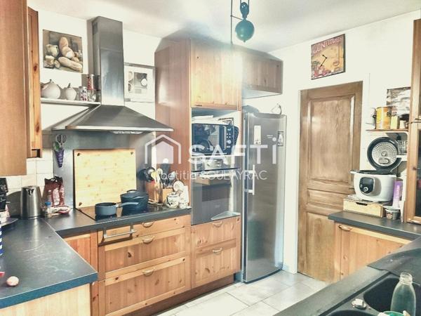 Maison plain-pied 125 m² avec garage et jardin