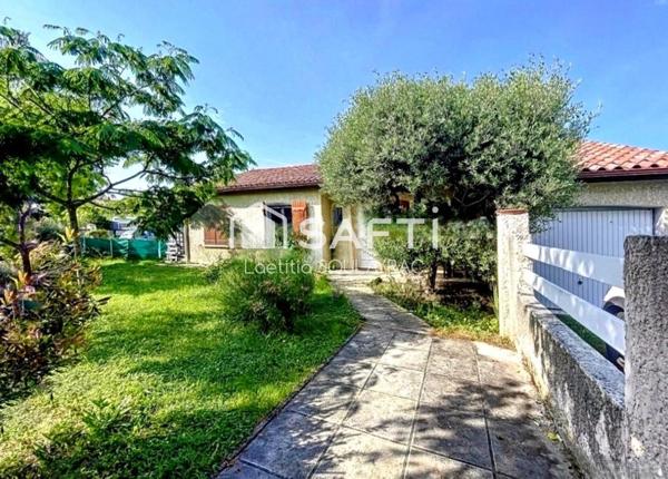 Maison plain-pied 125 m² avec garage et jardin