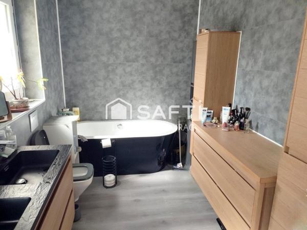 Maison plain-pied 125 m² avec garage et jardin