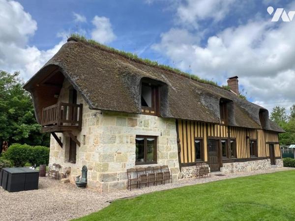 Entre Orbec et Livarot belle propriété composée de plusieurs maisons bel environnement