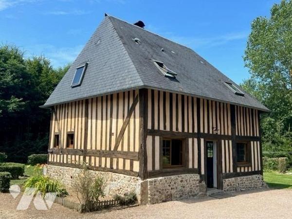 Entre Orbec et Livarot belle propriété composée de plusieurs maisons bel environnement