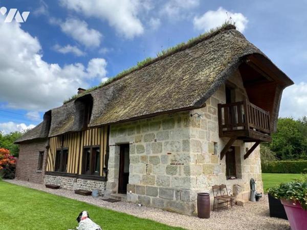 Entre Orbec et Livarot belle propriété composée de plusieurs maisons bel environnement